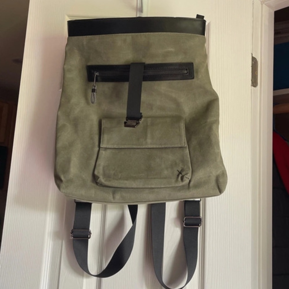 olive green roll-top backpack